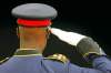 BORIS MINKEVICH / WINNIPEG FREE PRESS archives 
Police Chief Devon Clunis salutes police academy grads last year. A draft of a review of police operations proposes deep cuts.