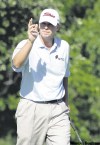 Donna McWilliam / the associated press
Steve Stricker acknowledges polite applause after draining his birdie putt on the sixth green Friday in Fort Worth.