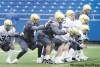 PHIL.HOSSACK@FREEPRESS.MB.CA
The Blue Bomber offensive linemen work out in the rain Monday at Canad Inns Stadium. Veteran Obby Khan says the group will be just fine, thanks.