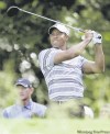 CP
Charles Krupa / the associated press
An acclaimed improviser, Tiger Woods lets rip with an old-fashioned, thundering blast off the ninth tee at Bethpage Black during a Monday practice round.