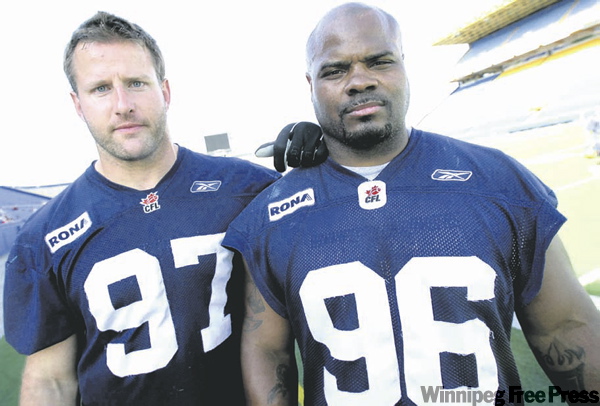 MIKE DEAL / WINNIPEG FREE PRESS
Grizzled veterans Doug Brown (left) and Tyrone Williams are no spring chickens, but the two defensive linemen have plenty of gas left in the tank.
