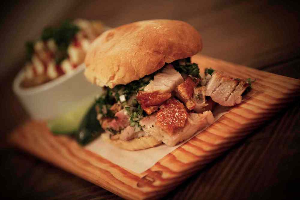 JOHN WOODS / WINNIPEG FREE PRESS
King + Bannatyne's Herb Roast Porchetta Sandwich