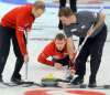 Bruce Bumstead/Brandon Sun
Skip Jeff Stoughton follows his shot behind teammates Reid Carruthers and Mark Nichols during the final game against Sean Grassie.