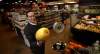 Phil Hossack / Winnipeg Free Press 
Vita Health's Matt Holtmann shows a melon Tuesday in local health-food chain's newest store at 3500 Portage Avenue.