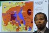 Joe Bryksa / Winnipeg Free Press
Manitoba Flood forecaster Phillip Mutulu framed by the new flood forecasting map at Tuesday's Provincial flood update.