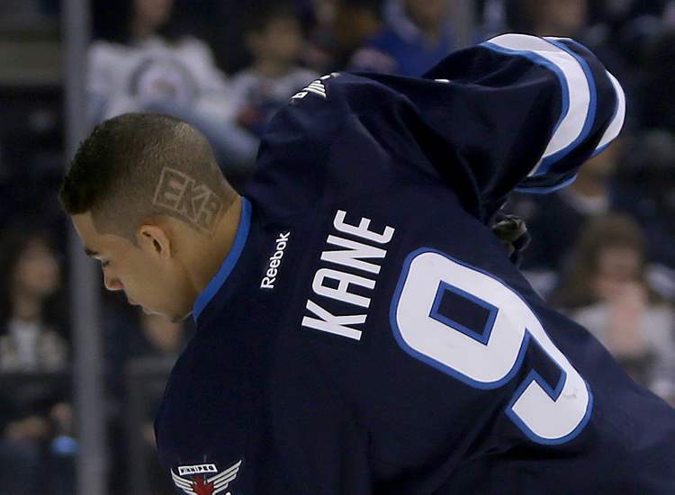TREVOR HAGAN / WINNIPEG FREE PRESS
Winnipeg Jets' Evander Kane (9) displays his personalized hairdo during warmup as the Jets prepare to face the Philadelphia Flyers at MTS Centre in Winnipeg, Saturday.