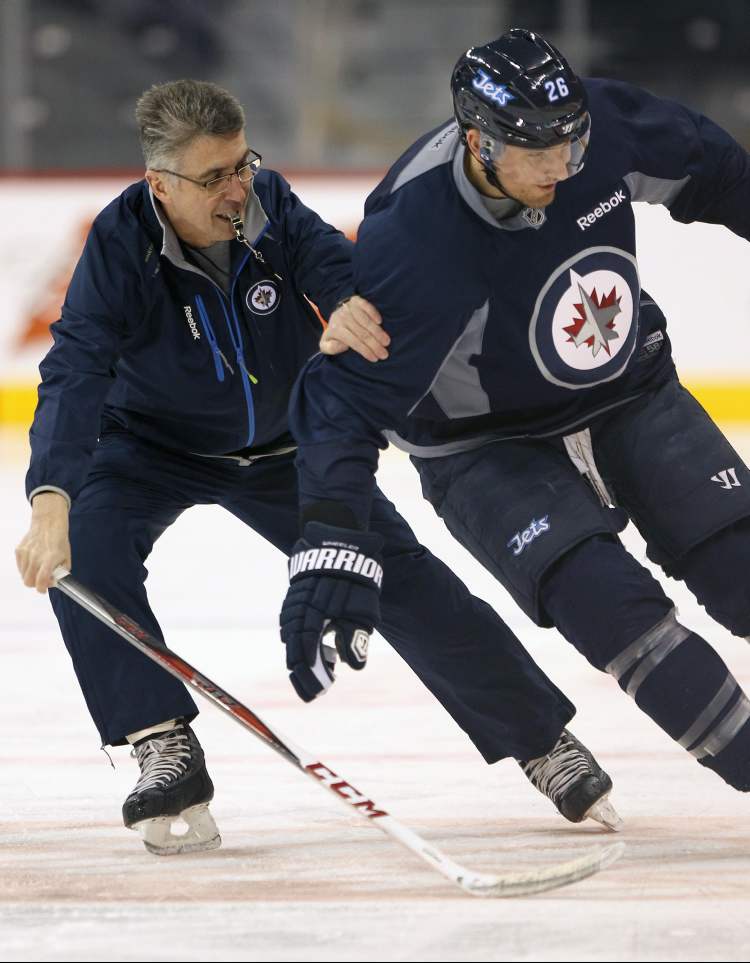 Joe Bryksa / Winnipeg Free Press
Head coach Claude Noel directs Blake Wheeler through a drill Monday morning during practice at the MTS Centre.