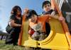 JOHN WOODS / WINNIPEG FREE PRESS
Ashley Vivier plays with her sons, Alex, 4, and Chris, 2. She says education is key to her family’s success.