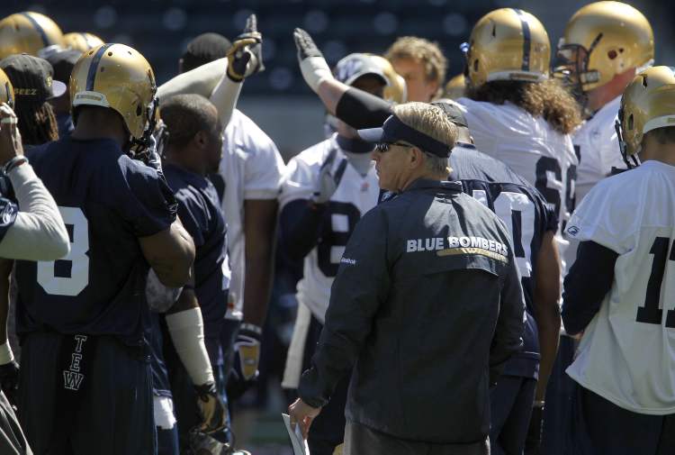 TREVOR HAGAN / WINNIPEG FREE PRESS Archives
Winnipeg Blue Bombers head coach Tim Burke running his first practice of the 2013 CFL season, Sunday. 'I told the first group of secondary people last night I wasn’t happy with their performance and if they don’t pick it up, they’re going to be gone,' said Burke