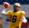 Former Arizona Cardinals quarterback Max Hall makes quick decisions and gets the ball off in a hurry.