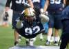 TREVOR HAGAN / WINNIPEG FREE PRESS
Blue Bomber Bryant Turner plunges onto the mat after going high in a kick-blocking drill Sunday. Team spirits are soaring now, but who knows what the future holds?