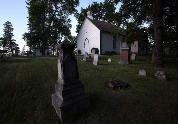 Tiny St. James the Assiniboine Anglican Church has served as a refuge for flooded settlers.