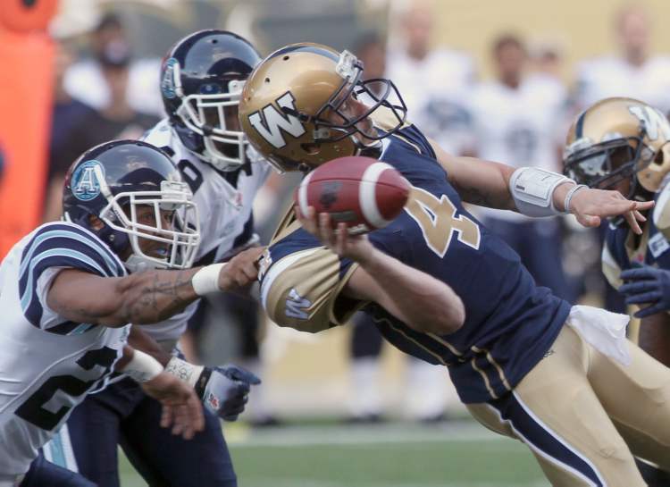 Joe Bryksa / Winnipeg Free Press
A big part of soothing fans' nerves will be keeping Buck upright, but as this pre-season game against Toronto suggests -- when Pierce was hammered three times -- the Bombers have some work to do on protecting him.