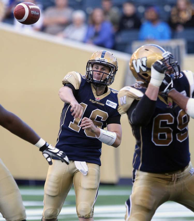 JOE BRYKSA / WINNIPEG FREE PRESS
Winnipeg Blue Bombers quarterback Max Hall heaves a pass during second-quarter action at Investors Group Field on Wednesday night.