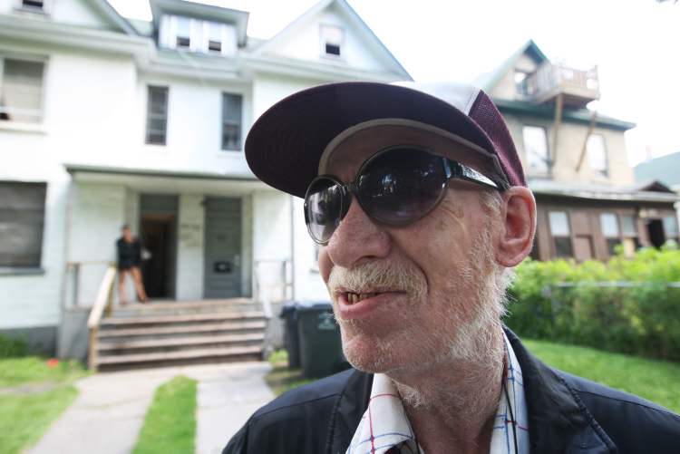 JOE BRYKSA / WINNIPEG FREE PRESS
Michael outside the Spence Street rooming house he calls home.