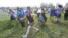 Mike Deal / Winnipeg Free Press
The traditional running of the tarps took place at the main stage Wednesday afternoon shortly after the opening of the 40th Winnipeg Folk Festival at Birds Hill Park.
