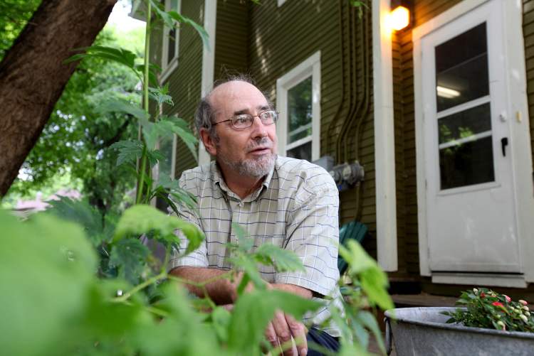 RUTH BONNEVILLE / WINNIPEG FREE PRESS
Mike Maunder at his Spence Street home, which is classified as a rooming house.