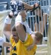 Joe bryksa / winnipeg free press
Backup QB Max Hall plays with three-year-old son Rex during Wednesday's practice at Investors Group Field.