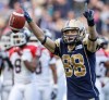 Jessica Burtnick / Winnipeg Free Press
Jade Etienne celebrates his first career touchdown pass in the end zone Friday evening, the first of two TD catches on the night. He was pleased with the personal milestone but unhappy with the loss.