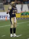 JOE BRYKSA / WINNIPEG FREE PRESS
Winnipeg Blue Bombers quarterback Max Hall looks for guidance from the bench after a string of fourth-quarter botched plays against the Hamilton Tiger Cats Friday night.