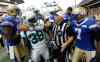 Trevor Hagan / Winnipeg Free Press
In this file photo, Saskatchewan Roughriders' Tristian Jackson (38) and Winnipeg Blue Bombers' Demond Washington (7) have to be separated on the Bomber sidelines as tempers flare during the Banjo Bowl in 2013.