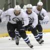 Joe Bryksa / Winnipeg Free Press
Winnipeg Jets captain Andrew Ladd, left, Jim Slater and Evander Kane skate during a practice at the MTS Iceplex Tuesday.