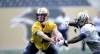 Ruth Bonneville / Winnipeg Free Press
Winnipeg quarterback Justin Goltz (left) hands the ball to tailback Will Ford during Thursday's practice at Investors Group Field.