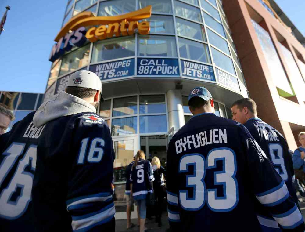 TREVOR HAGAN / WINNIPEG FREE PRESS files
Winnipeg Jets fans walk into the MTS Centre.