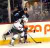 Phil Hossack / Winnipeg Free Press
Ivan Telegin of the Winnipeg Jets collides with Steven Kampfer of the Minnesota Wild during the first period of Thursday night's game.