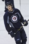Mike Deal / Winnipeg Free Press
Adam Lowry skates at practice Sunday morning at the MTS Centre.