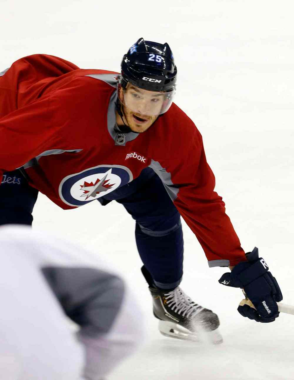KEN GIGLIOTTI / WINNIPEG FREE PRESS
Defenceman Zach Redmond says, with only two exhibition games left before the season opens, the Jets are “more of a team, rather than a training camp. Everything starts to get whittled down and fine-tuned.”