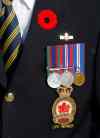 Harvey Thiesen  with poppy and WW2 medals - Harvey Friesen joined the PPCLI at age 16 in 1943 and was  kept in the  service in  Canada until he was 18  but the war had ended preventing him from going over seasto fight. .He lives in Winkler and helped create a WW1 WW2 Cenotaph in the Town of Winkler  - Remembrance Day Feature ��� Mennonite soldiers  who joined the army during WW2 were shunned by their  community upon their return to Winkler   after WW2 ��� they formed their own church Altona United Church  started in 1953  -Randy Turner story  KEN GIGLIOTTI / Oct. 23 2013 / WINNIPEG FREE PRESS