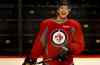 Ruth Bonneville / Winnipeg Free Press
Zach Redmond will play his first NHL regular season game since the femoral artery in his right leg was cut by an errant skate in a freak accident during Jets practice in Raleigh, N.C., Feb. 21.