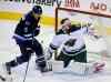 TREVOR HAGAN / FREE PRESS archives
Winnipeg Jets' Matt Halischuk jumps over a shot as he tries to screen Minnesota Wild's goaltender Niklas Backstrom Saturday.