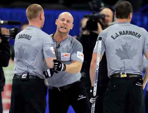 BORIS MINKEVICH / WINNIPEG FREE PRESS
Ryan Fry (centre) has a similar intensity to teammates Brad Jacobs (left) and E.J. Harnden, as was evident after their win over Kevin Martin Thursday.