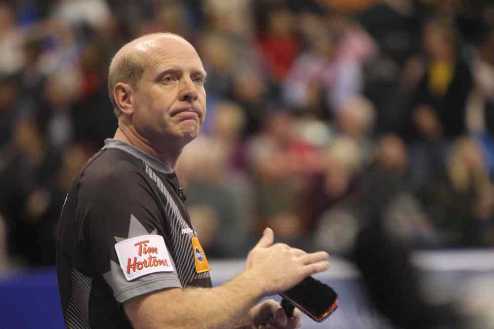 Ruth Bonneville / Winnipeg Free Press
Skip Kevin Martin has little to smile about after losing 7-5 to former teammate John Morris in the Roar of the Rings Olympic curling trials men's semifinal at the MTS Centre Saturday.