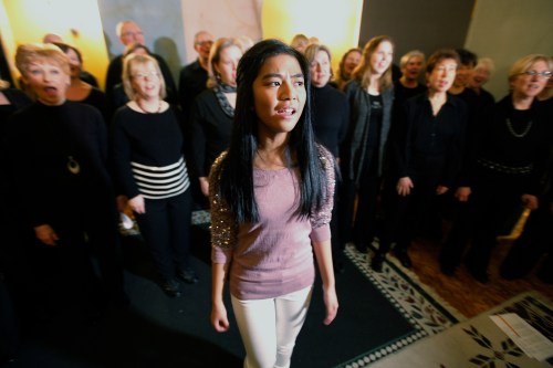 John Woods / Winnipeg Free Press
Maria Aragon, backed by the Winnipeg Philharmonic Choir, sings her benefit single, United We stand, at Private Ear recording studio.