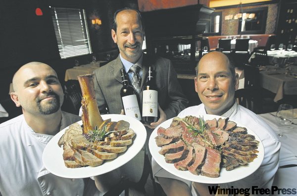 JOE.BRYKSA@FREEPRESS.MB.CA 
Pleased to meat you: (from left) chef Simon Resch serves the fantastic osso buco; general manager Michael Lazer; and Michael Dacquisto with bistecca fiorentina, which will easily serve at least three people, regardless of what the menu says.