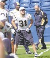 KEN GIGLIOTTI / WINNIPEG FREE PRESS 
Blue Bombers head coach Mike Kelly (right) has been an extremely busy man since arriving in Winnipeg.
