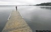 JOE.BRYKSA@FREEPRESS.MB.CA
Allison Scholl, on the dock at Big Whiteshell Lodge on Big Whiteshell Lake, watches rain clouds roll in over the water Thursday. Typical summer day this year.