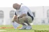 JOE.BRYKSA@FREEPRESS.MB.CA 
Blue Bombers head coach Mike Kelly ponders the mysteries of life and football during Wednesday's workout.