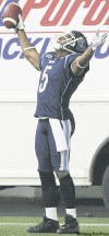 CANWEST NEWS SERVICE
Circus kvetch: Argos receiver Arland Bruce is whining it up under Toronto's big top.