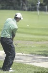 TREVOR.HAGAN@FREEPRESS.MB.CA 
Tyler Mancini chips toward victory during the Manitoba Mid-Amateur.