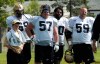 KEN GIGLIOTTI / WINNIPEG FREE PRESS
Waterboy Justin Rabb hangs out with the offensive line (from left) Glenn January, Brendon LaBatte, Obby Khan and Kelly Bates at practice.