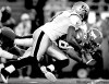 JEFF MCINTOSH / THE CANADIAN PRESS
Winnipeg's Ike Charlton hauls down Calgary's Jeremaine Copeland Saturday.
