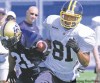 KEN GIGLIOTTI / WINNIPEG FREE PRESS
Head coach Mike Kelly keeps an eye on receiver Romby Bryant (81) at Bomber practice. Bryant only has 12 catches for 148 yards so far this season.