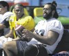 TREVOR.HAGAN@FREEPRESS.MB.CA
Blue QB Michael Bishop chats on the sidelines with bespectacled offensive lineman Obby Khan on Wednesday. Fans are running out of patience with the offence.