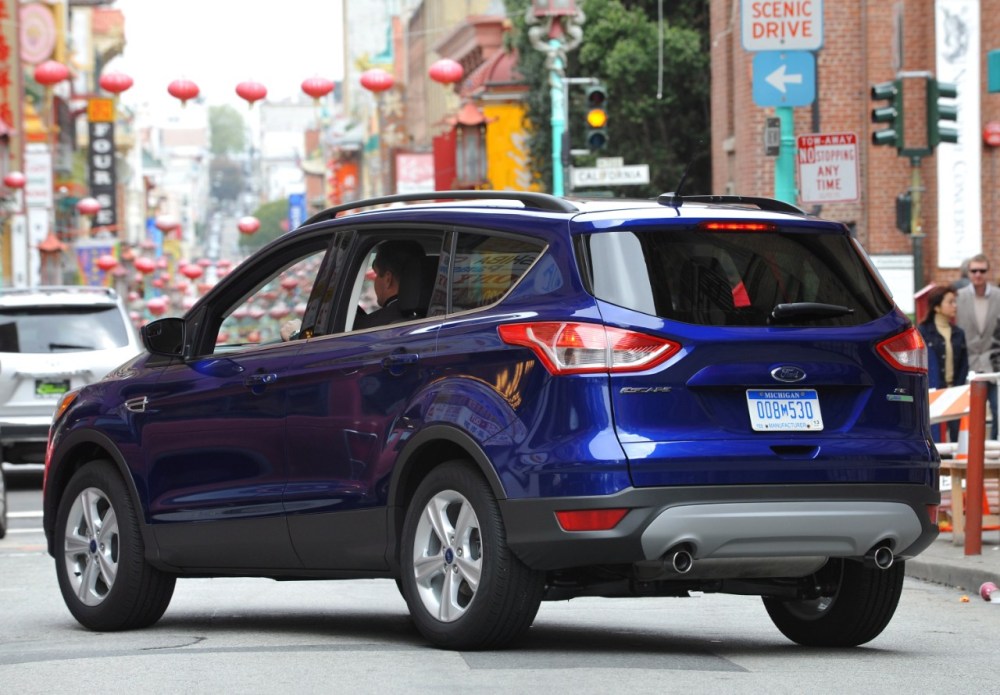 The Ford Escape is one of several vehicles that will parallel park itself, with just a bit of help from you.