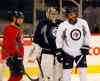 KEN GIGLIOTTI / WINNIPEG FREE PRESS
Dustin Byfuglien, right, shares a laugh with teammates as the Winnipeg Jets practise at the MTS Centre Thursday.