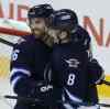 TREVOR HAGAN / WINNIPEG FREE PRESS
New Jets: Andrew Ladd (16) and Jacob Trouba (8) at the MTS Centre in January 2014.